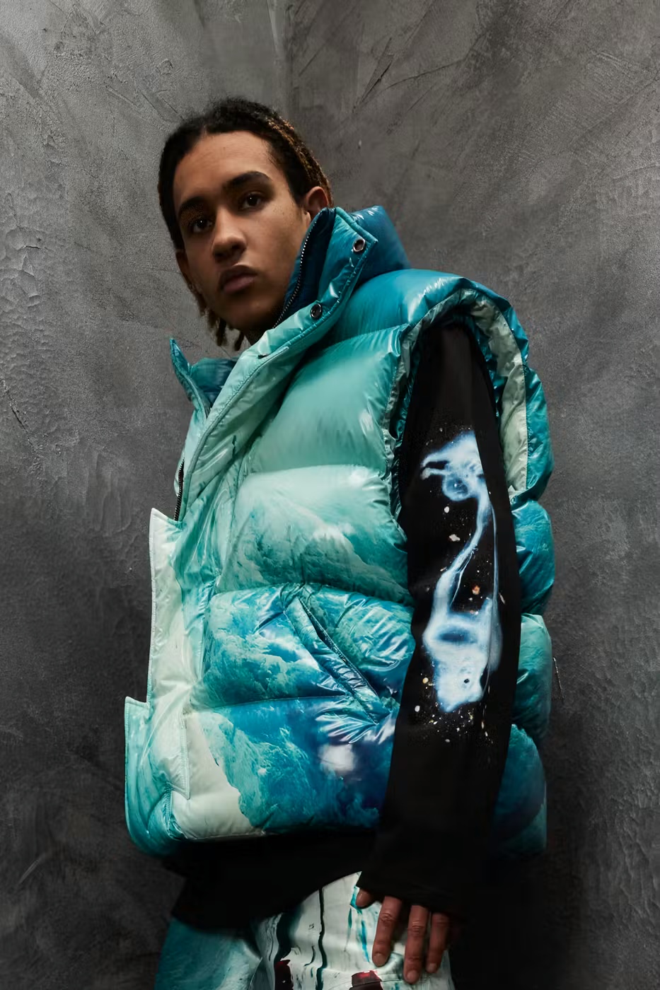Members of the Rage — glacier-print puffer vest with nebula graphic sleeve